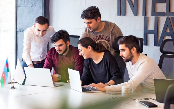 colleagues-working-project-discussing-details_114579-2817