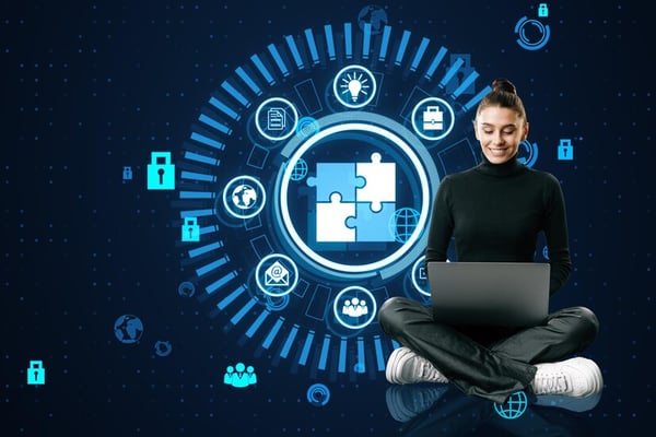 happy-businesswoman-using-laptop-with-creative-round-data-management-hologram-with-jigsaw-puzzle-dark-background-data-business-hud-cloud-concept_670147-85090